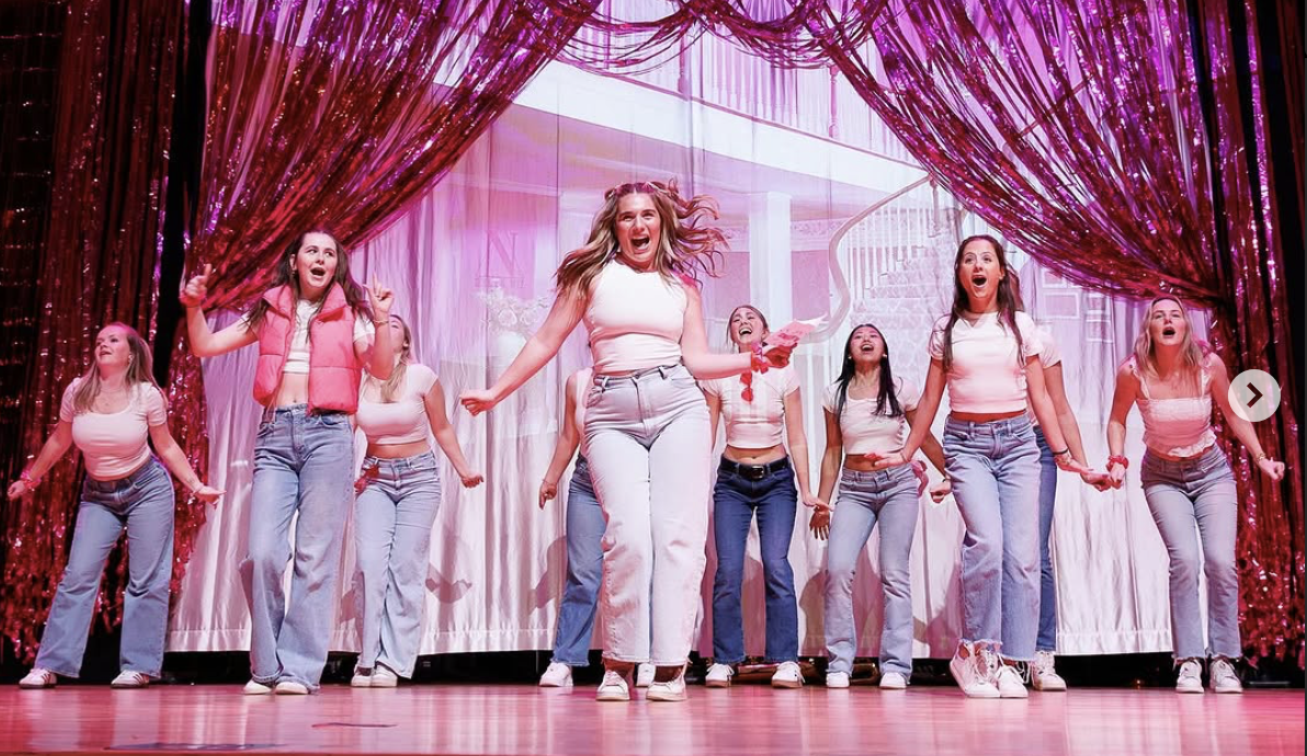 The cast of The 24 Hour Musical Project’s “Legally Blonde” celebrates under a shower of confetti at the conclusion of their show. (Courtesy of Wake Forest University)